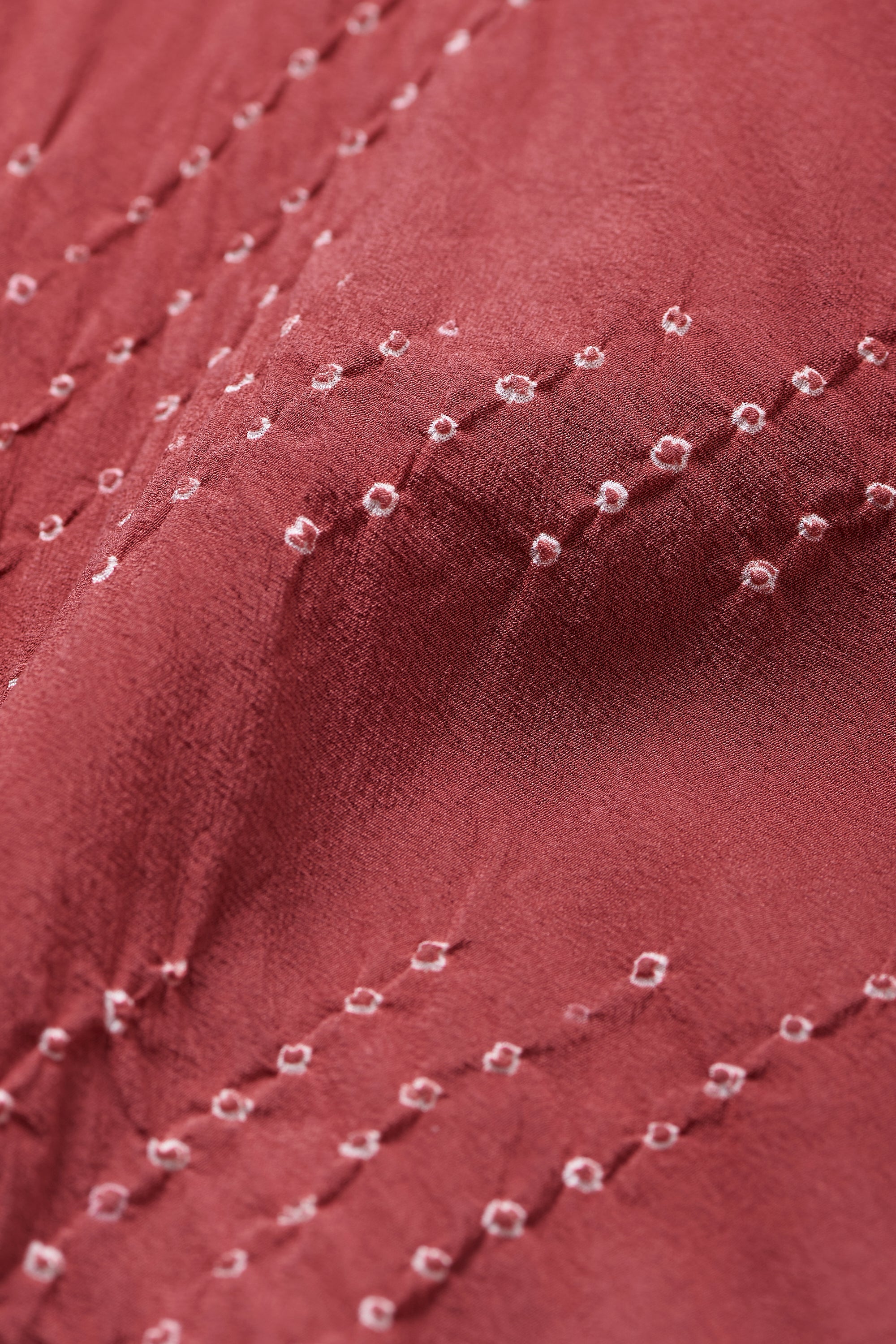 Crimsom Pink Crepe Silk Flared Shirt Featuring Miniature Bandhani