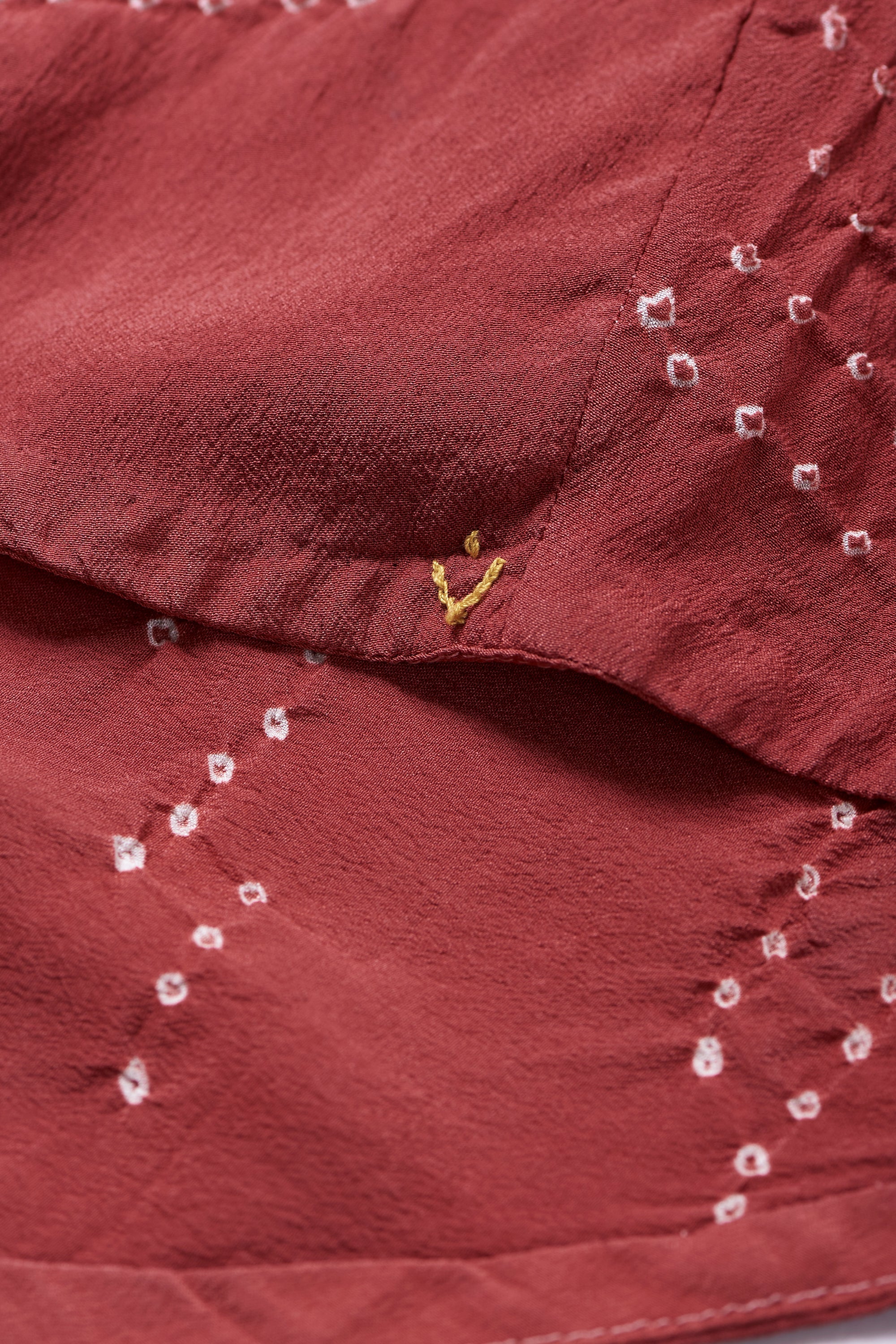 Crimsom Pink Crepe Silk Flared Shirt Featuring Miniature Bandhani