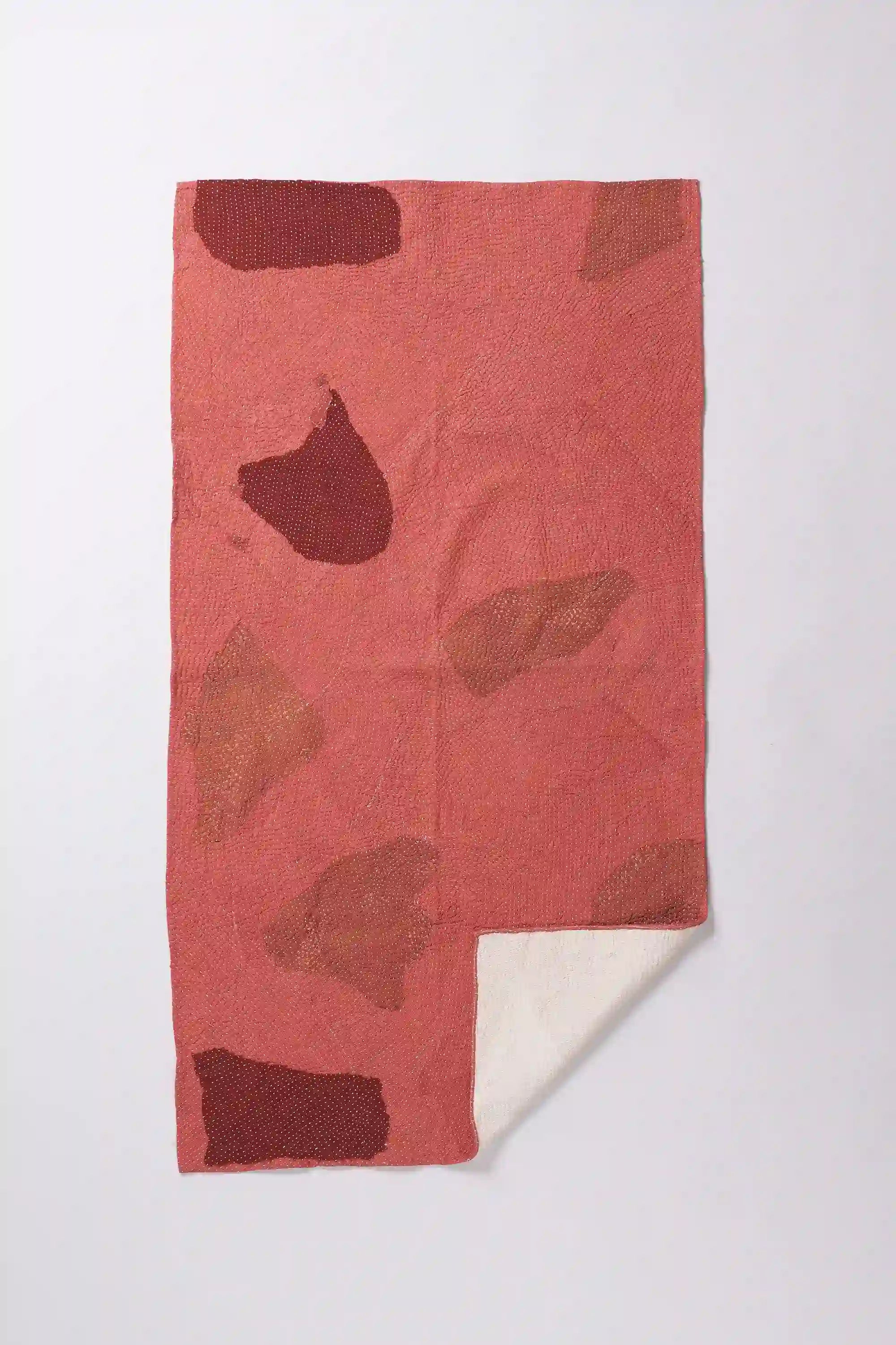 Red  quilt with patchwork work