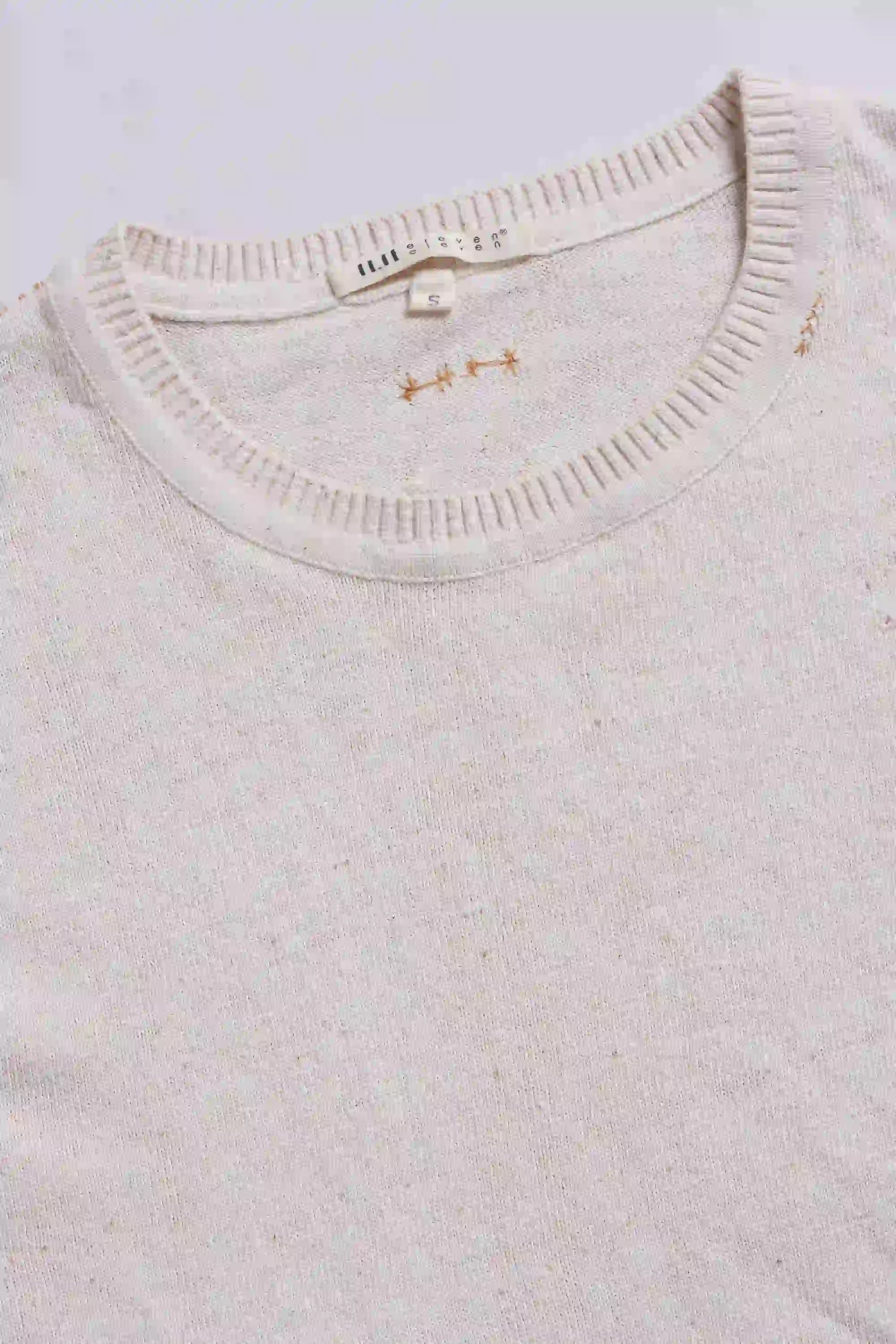 Fabric close-up with hand detailing