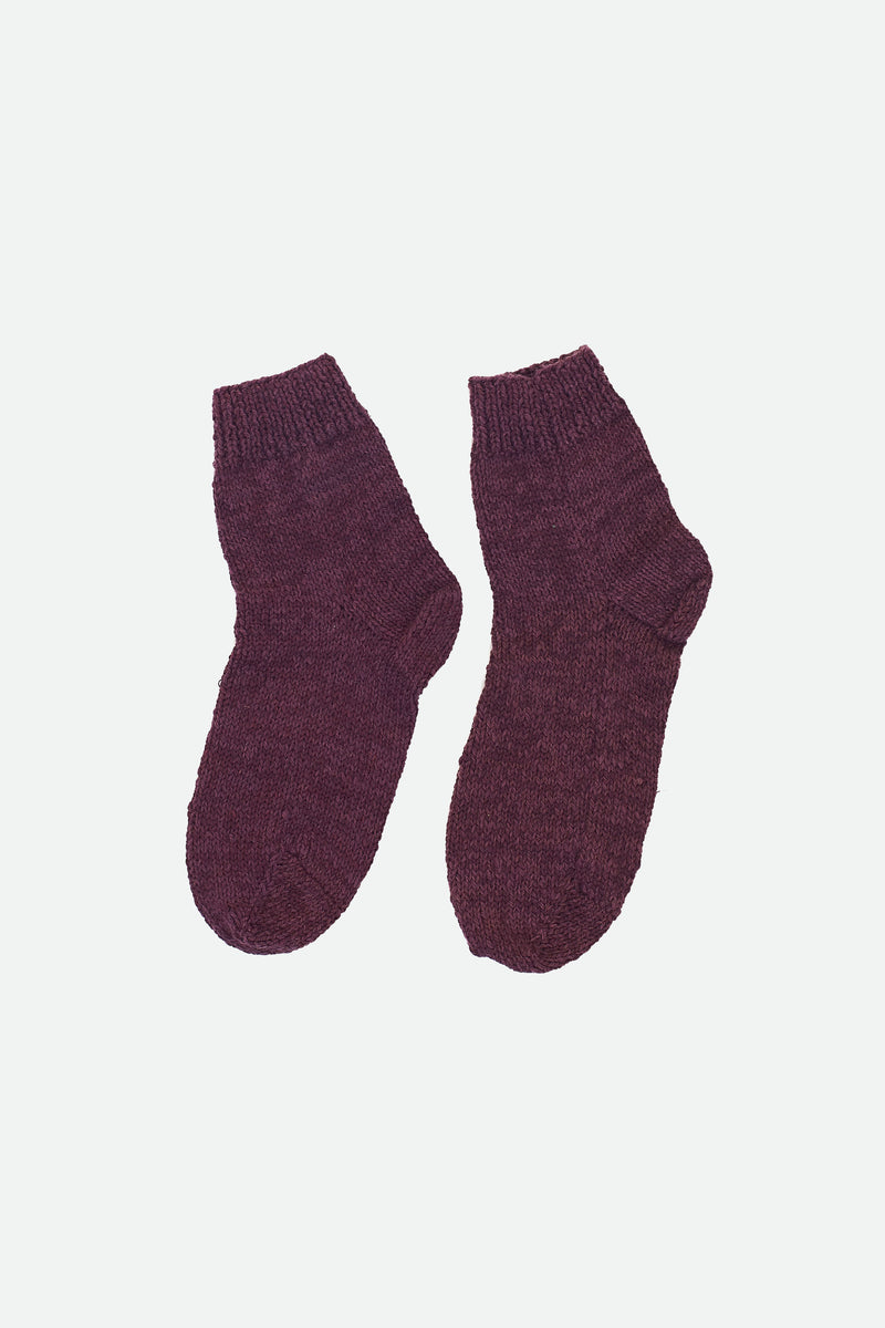 HAND-KNITTED PAIR OF SOCKS DYED IN PURPLE RED