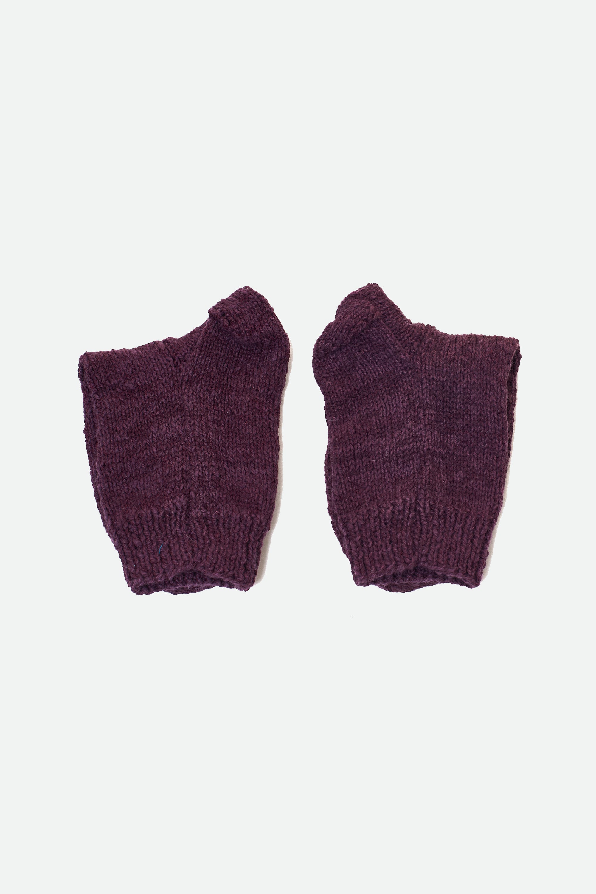 HAND-KNITTED PAIR OF SOCKS DYED IN PURPLE RED