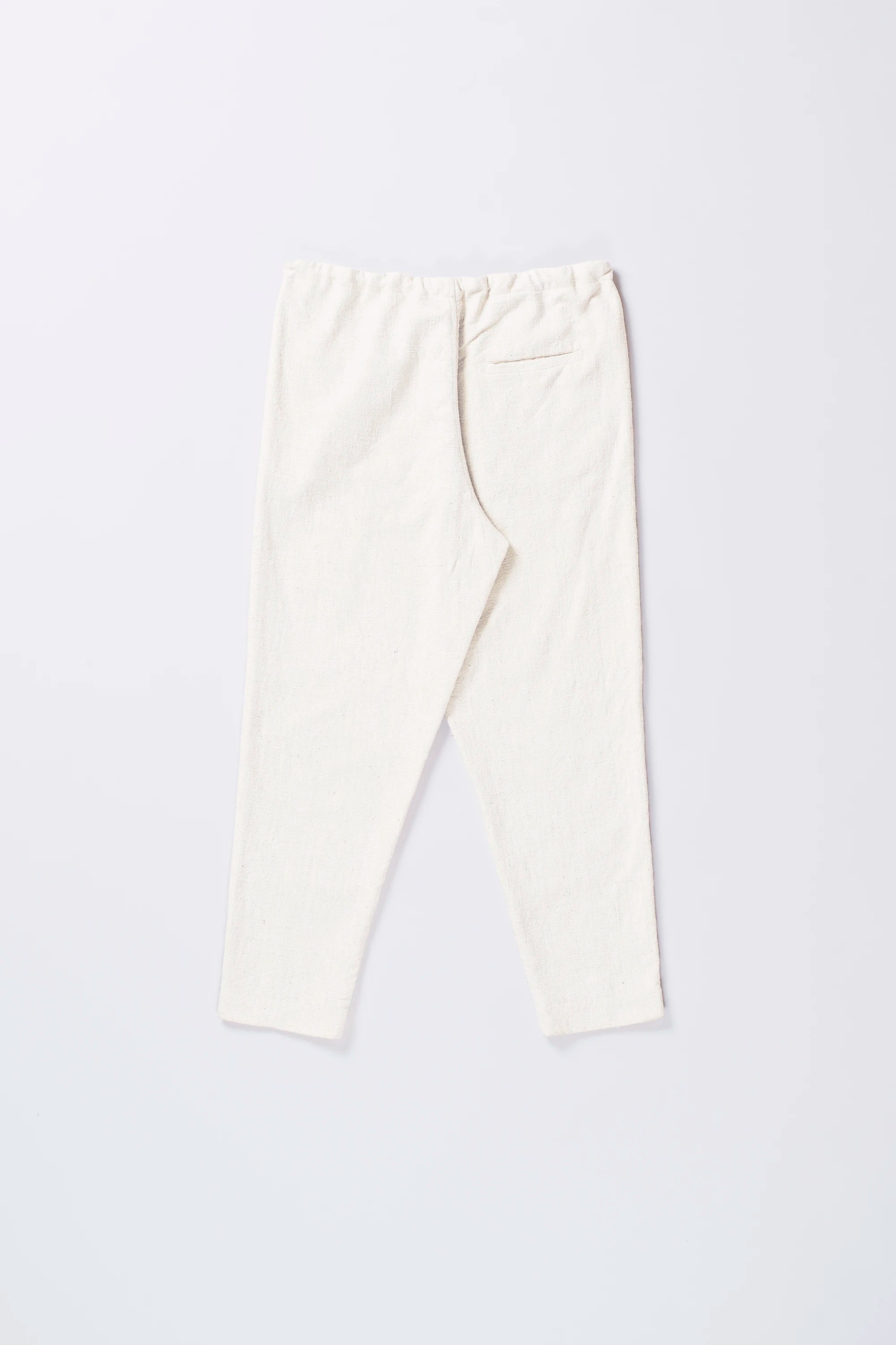 Back image of ecru cotton pant with pocket