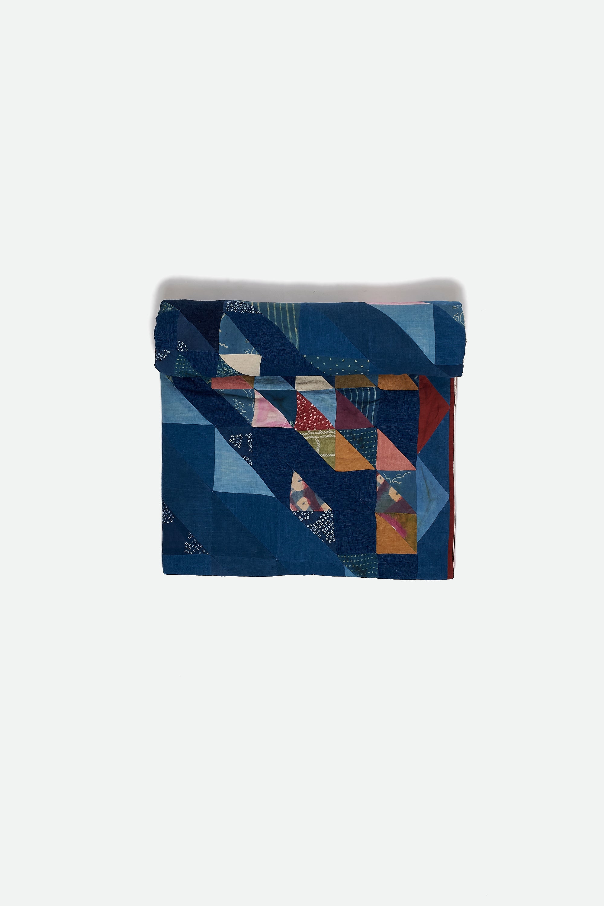 ANGULAR PATCHWORK QUILT IN SHADES OF INDIGO