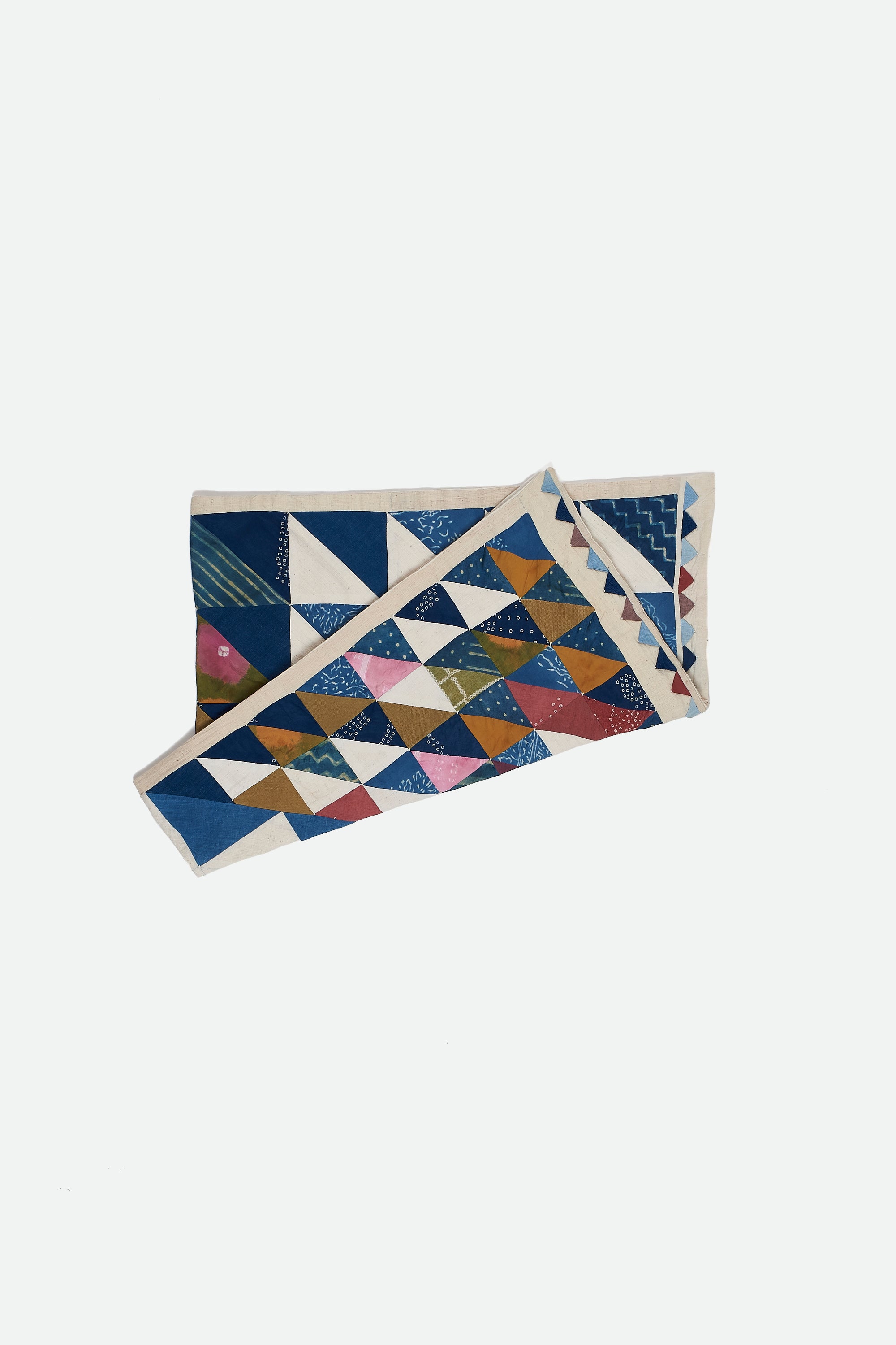 ANGULAR PATCHWORK QUILT IN SHADES OF ECRU AND INDIGO
