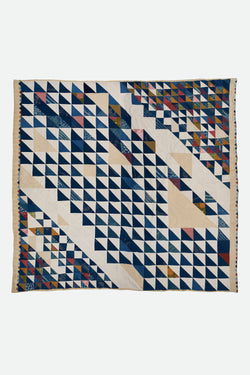 ANGULAR PATCHWORK QUILT IN SHADES OF INDIGO