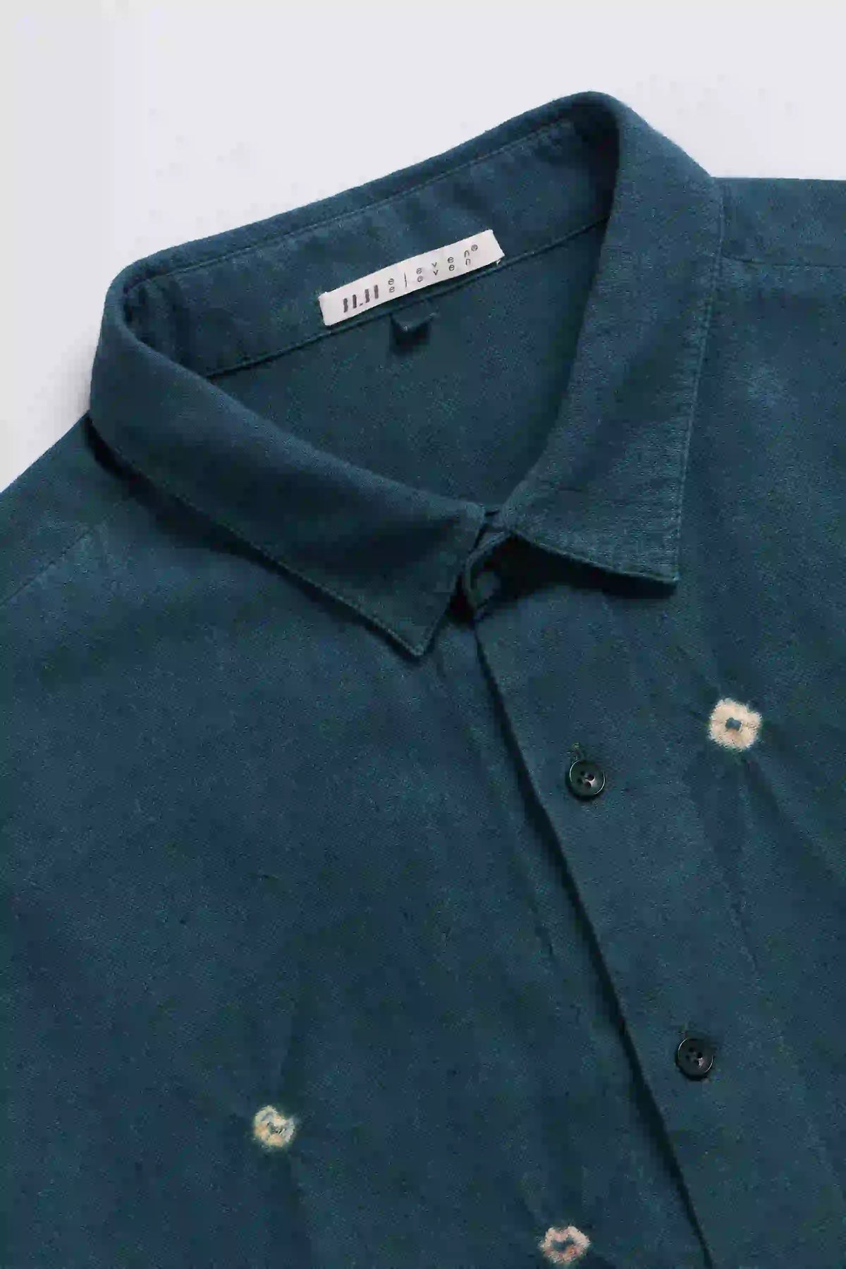 Fabric close-up with collar and buttons
