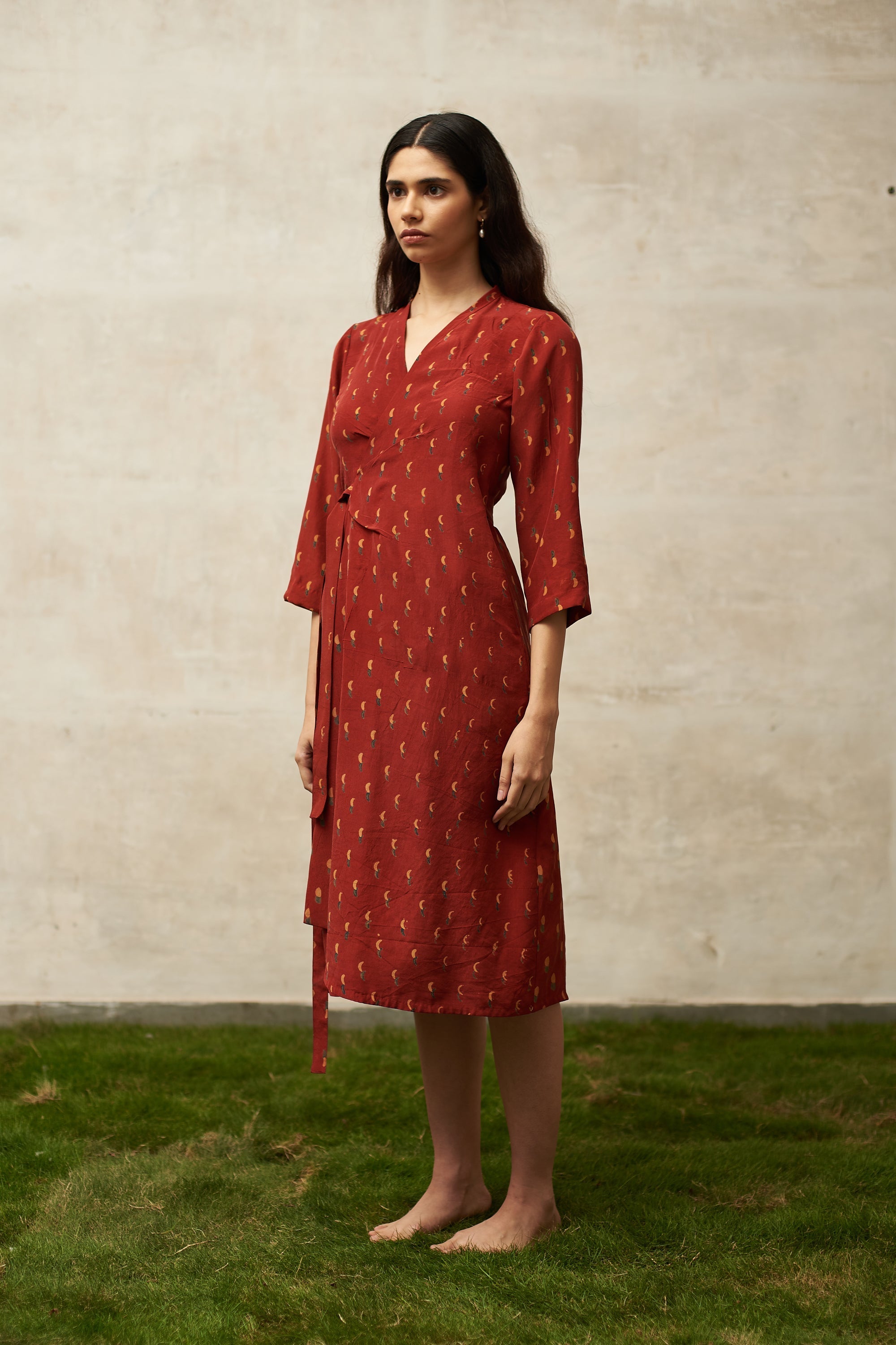 RED BLOCK PRINTED STATEMENT WRAP DRESS